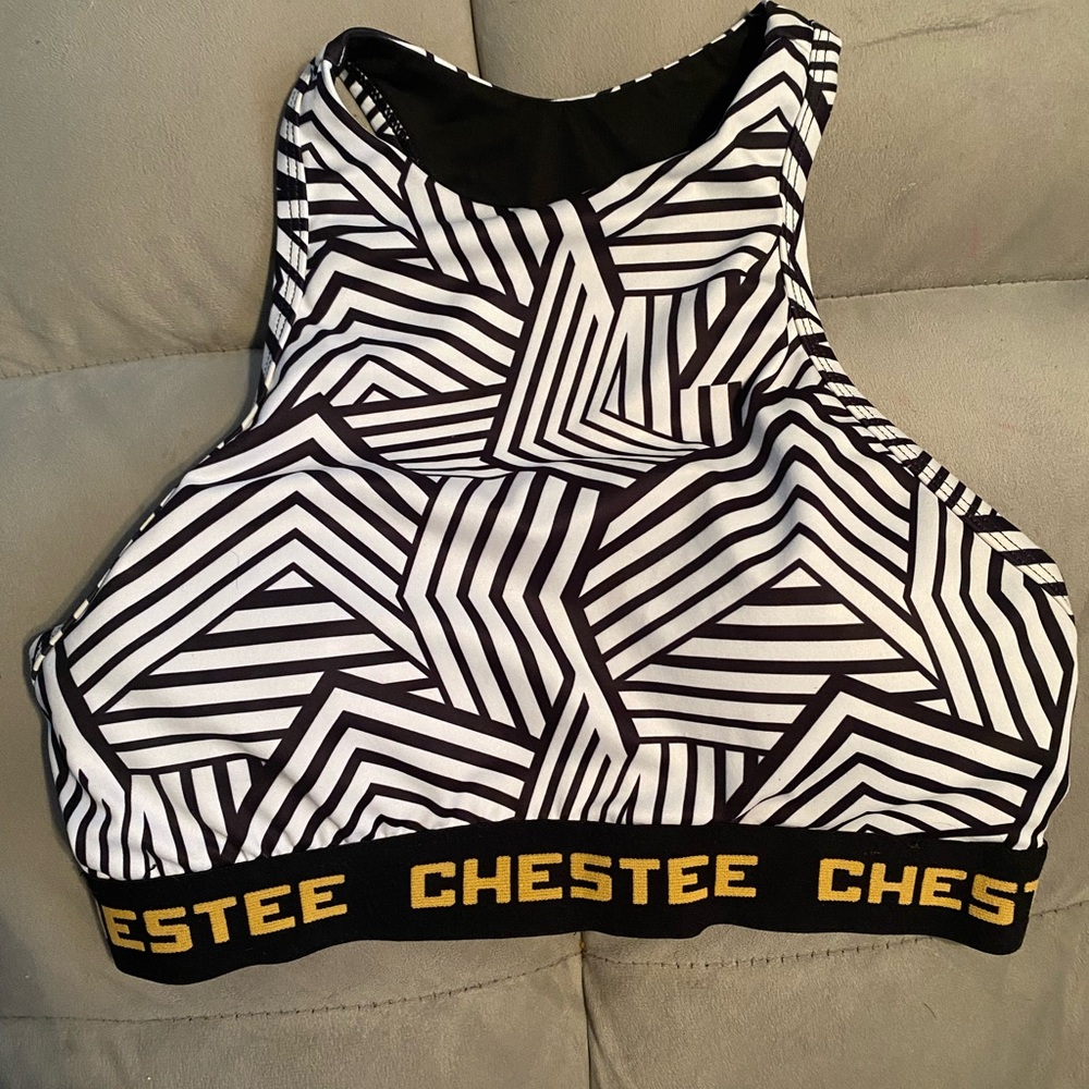 Chester sports bra. Black, white, and yellow. Size small. Gently used.